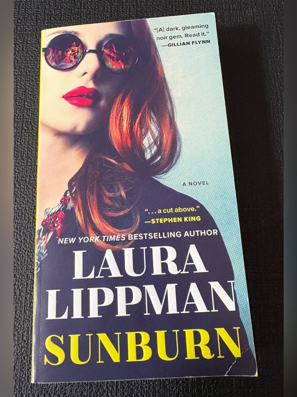 2/$10 “Sunburn" Paperback Book - by Laura Lippman